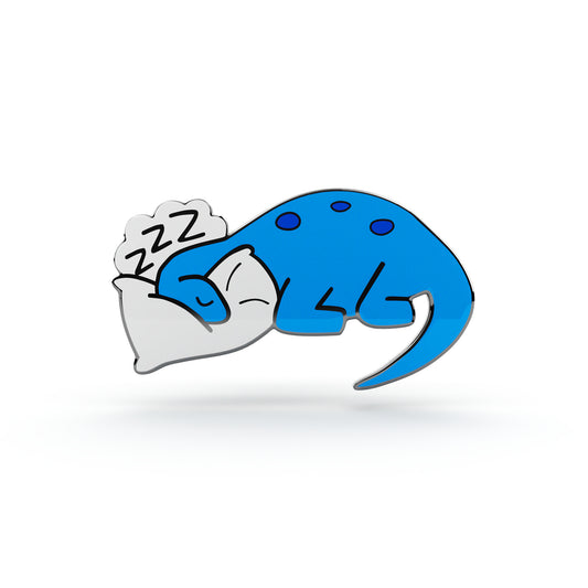 Dinozaur niebieski śpiący na poduszce - przypinka dla dziecka