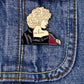 Grease Olivia Newton - John Sandy przypinka