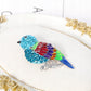 Ptaszek gołąb - broszka z kolorowymi cyrkoniami