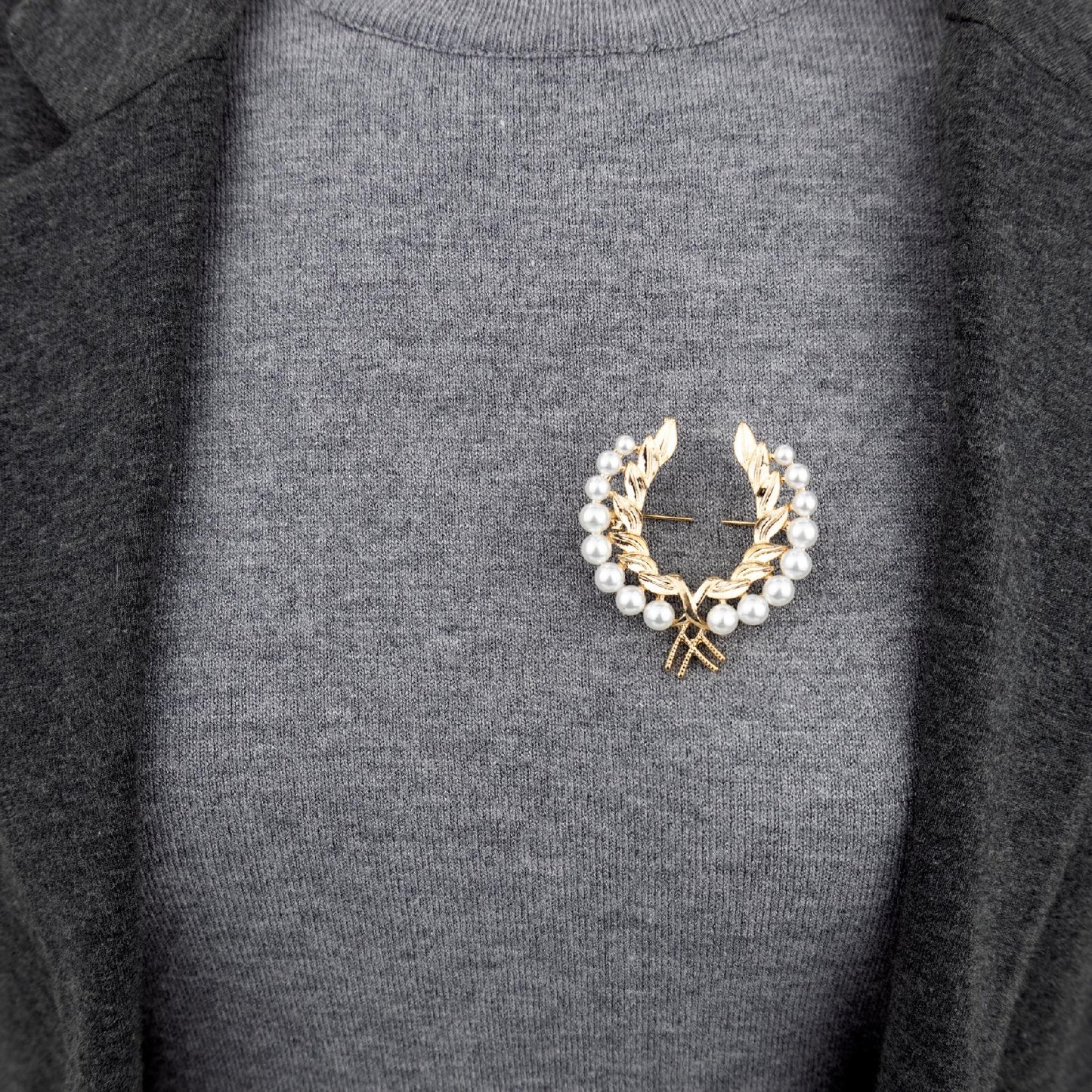 Wawrzyn - broszka w kształcie lauru olimpijskiego