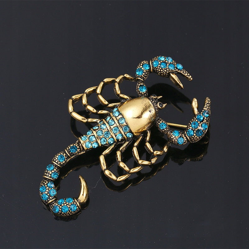 Skorpion z cyrkoniami broszka