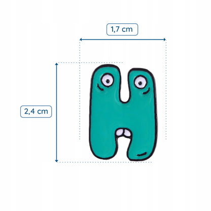 Litera H z oczami i zębami - zielona przypinka