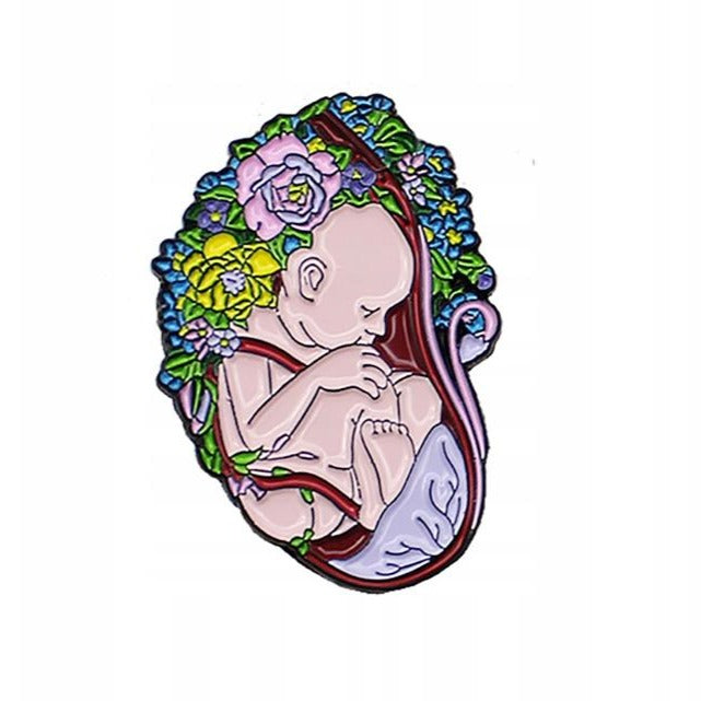 Płód dziecka przypinka z kwiatami